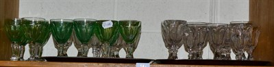 Lot 141 - A shelf of clear and green glass drinking glasses
