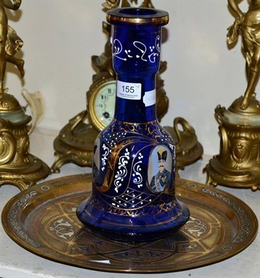Lot 155 - An enamelled blue Persian glass huqqa base and a Persian inlaid brass and white metal tray