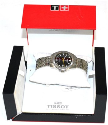 Lot 172 - A stainless steel wristwatch, signed Tissot, with Tissot box