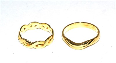 Lot 182 - An 18 carat gold scroll band ring, finger size P and an 18 carat gold  twisted band ring,...