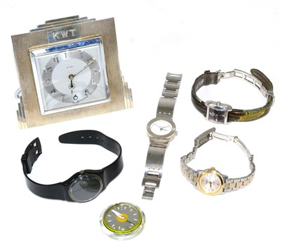 Lot 187 - A Bravingtons Ltd, London desk timepiece, two Tissot lady's wristwatches, two Swatch watches...