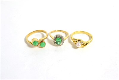 Lot 198 - A 9 carat gold green paste and diamond cluster ring, total estimated diamond weight 0.15 carat...