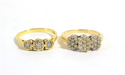 Lot 209 - An 18 carat gold diamond three stone ring, graduated round brilliant cut diamonds in illusion...