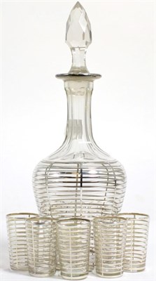 Lot 217 - An early 20th century white metal clad liqueur decanter with five glasses (6)