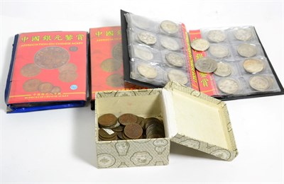 Lot 233 - A group of reproduction Chinese coins; three albums of Chinese Ackey and a box of assorted...