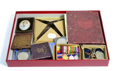 Lot 235 - A Second World War Defence medal with ribbons; coins; postcards; death plaque and a cased miniature