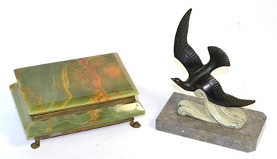 Lot 242 - A cold painted bronze model of a gull in flight on a marble base together with an onyx box (2)