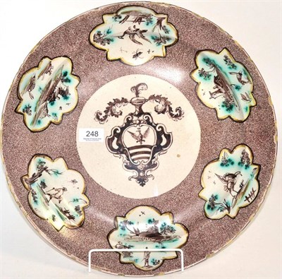 Lot 248 - A Savona Faience circular dish, 18th century, painted in manganese with an armorial on a...