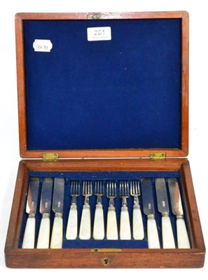 Lot 261 - A silver bladed and mother of pearl handled set of fruit knives and forks in an oak case