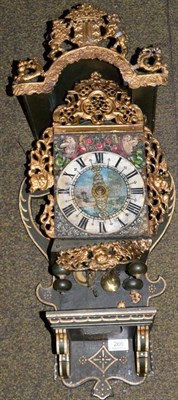 Lot 266 - A Dutch thirty hour wall clock, 19th century, gilt painted cast lead pierced frets, polychrome...