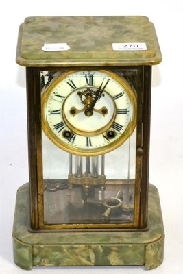 Lot 270 - A brass and green onyx striking mantel clock by Ansonia