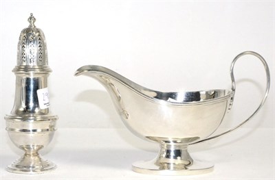 Lot 292 - A silver sauce boat and a silver baluster caster