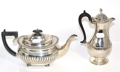 Lot 300 - An Edwardian silver teapot, George Nathan & Ridley Hayes, Chester 1909; together with a silver...