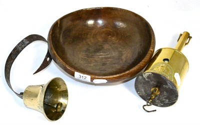 Lot 312 - A 19th century turned oak bowl, a brass meat jack and doorbell