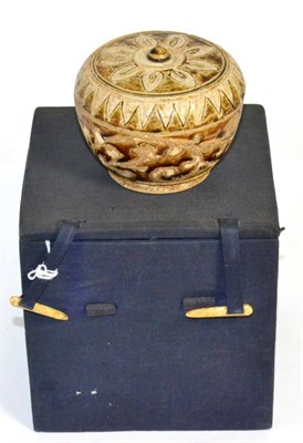 Lot 316 - A Sawankhalok stoneware covered box, 14th/15th century, of ovoid form, incised and painted in olive