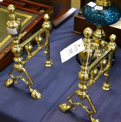 Lot 326 - A pair of brass andirons