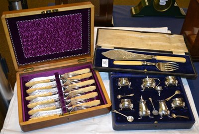 Lot 333 - A cased silver condiment set; cased part set of fish eaters; and a set of fish servers