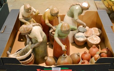 Lot 1059 - A collection of Peruvian pottery figures