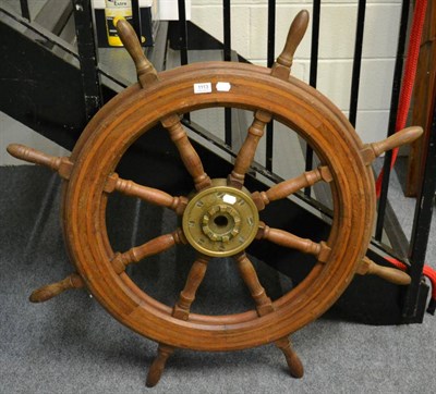 Lot 1113 - An oak and brass eight spoke ships wheel