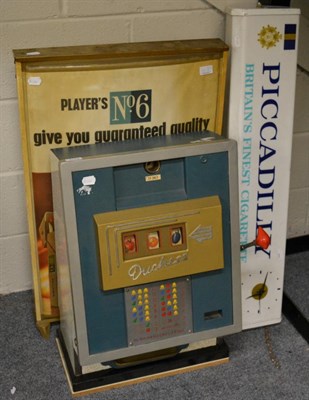 Lot 1114 - Players Cigarettes advertising sign, a Piccadilly advertising clock and a one armed bandit