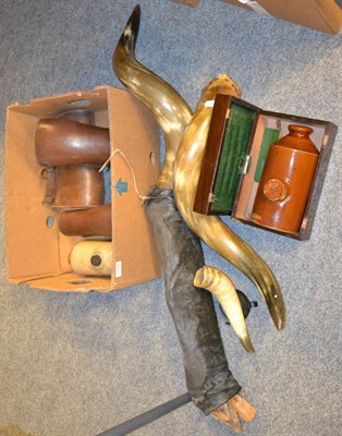 Lot 1116 - A box containing leather gaiters, bovine horns etc