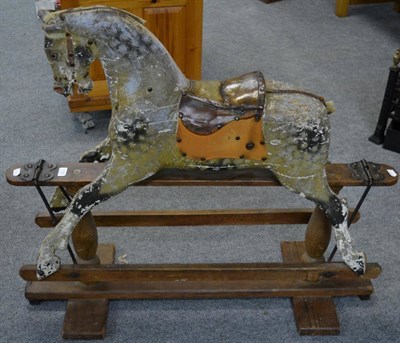 Lot 1130 - A late 19th century trestle based painted wooden rocking horse (a.f.)