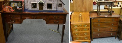 Lot 1145 - A reproduction leather inset writing desk together with a bureau; a mahogany four height chest...