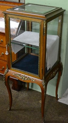 Lot 1170 - A gilt metal mounted display cabinet