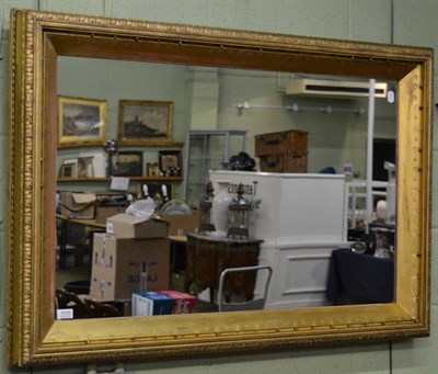 Lot 1173 - A gilt framed rectangular mirror