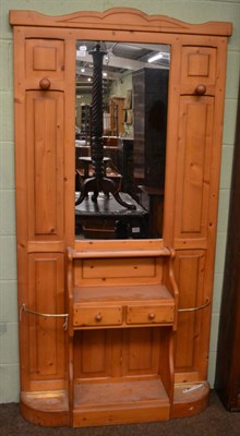 Lot 1190 - A pine mirrored hall stand