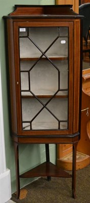 Lot 1191 - Edwardian mahogany and satinwood banded free standing corner cupboard