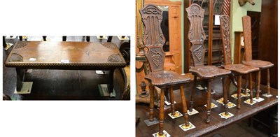 Lot 1194 - Four carved and stained oak spinning chairs by Henry Rousell, Minehead and a similar stool (5)