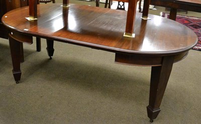 Lot 1213 - Early 20th century mahogany extending dining table with two leaves raised on square tapering legs