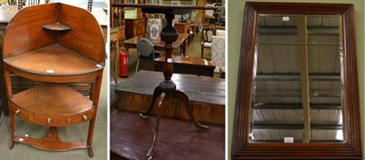 Lot 1214 - George III mahogany bow fronted washstand; a mahogany tripod table; and a walnut mirror with reeded