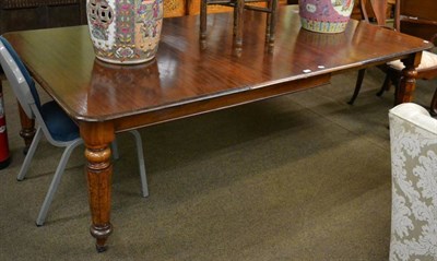 Lot 1233 - Victorian mahogany extending dining table fitted one leaf