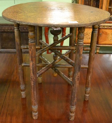 Lot 1234 - A 19th century inlaid oak circular occasional table with folding stand