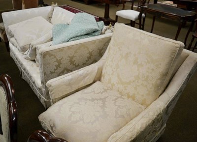 Lot 1235 - Knoll style drop end sofa upholstered in cream floral fabric; and an armchair upholstered to match