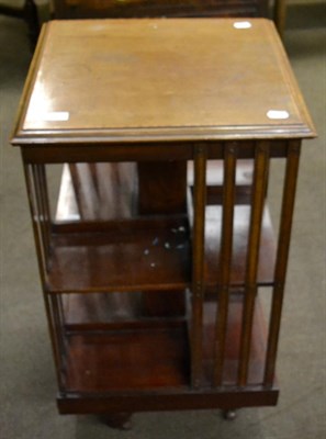 Lot 1257 - An Edwardian mahogany and satinwood banded revolving bookcase, early 20th century, with slatted...