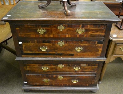 Lot 1259 - A four height chest of drawers composed of 18th century elements, in two sections