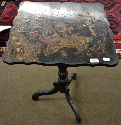 Lot 1265 - A Japanned tripod table