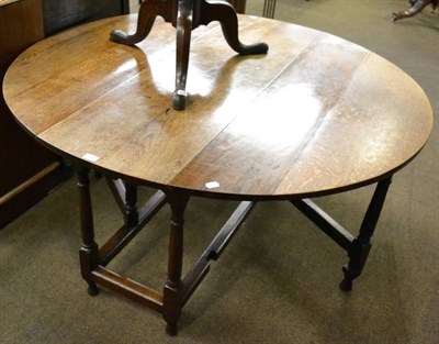 Lot 1269 - An 18th century oak gateleg table