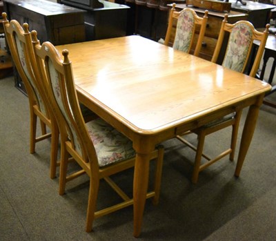 Lot 1270 - An Ercol oak five piece dining suite comprising a table and a set of four high back chairs