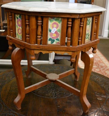 Lot 1274 - A Peranaken style side table with a marble top