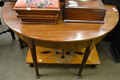 Lot 1277 - A 19th century mahogany D end table on pad feet