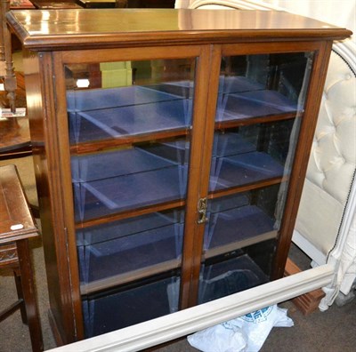 Lot 1285 - Mahogany glazed bookcase, circa 1900, enclosing three shelves