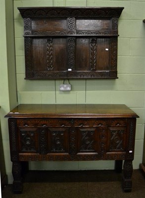 Lot 1295 - Carved oak chest in the 17th century style, with fall front; together with a carved oak panel