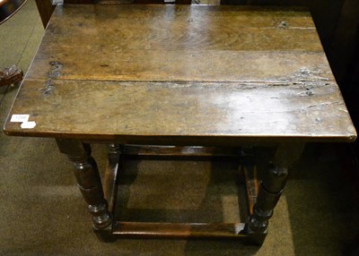 Lot 1298 - An oak side table with rectangular top raised on turned legs, 17th century in part