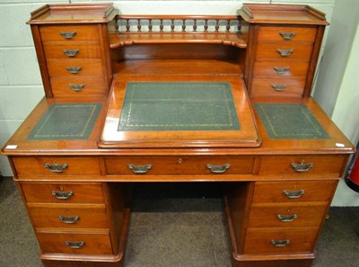 Lot 1305 - A Victorian mahogany twin pedestal kneehole desk with super structure