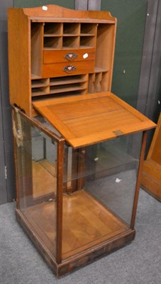 Lot 1321 - Mid 20th century shop display cabinet with three glazed sides and to the top, mahogany door to...