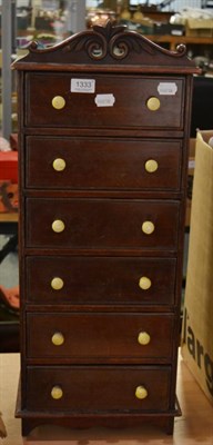 Lot 1333 - Apprentice piece table top mahogany chest of six drawers, on bracket feet with carved...